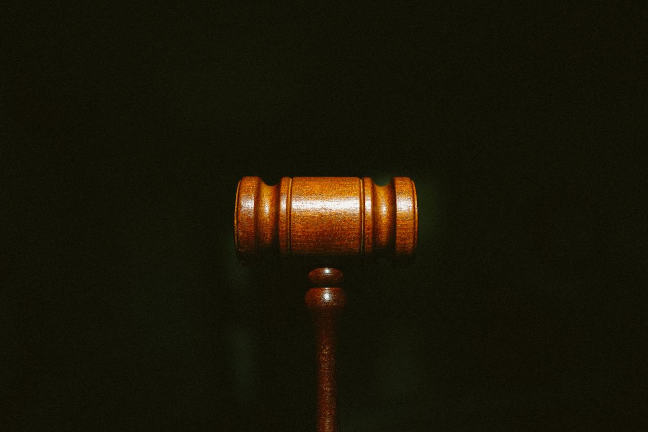 wooden gavel on dark background